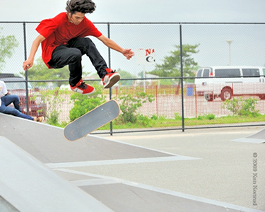 Teen skateboarding