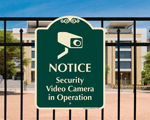 Security Cameras in Operation Signs