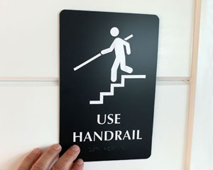 Use Handrail Sign