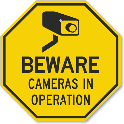Surveillance camera in operation sign
