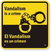 Bilingual Vandalism Is A Crime With Handcuffs Sign