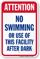 Attention No Swimming After Dark Sign