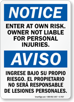 Enter At Own Risk Bilingual Sign