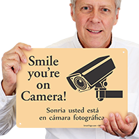 Bilingual Smile You're On Camera Sign With Graphic