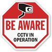 Be Aware CCTV. In operation with graphic sign