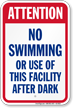 Attention No Swimming After Dark Sign