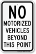 No Motorized Vehicles Beyond This Point Sign