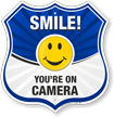 Smile You are On Camera Shield Sign