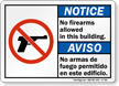 Bilingual No Firearms Allowed In This Building Sign