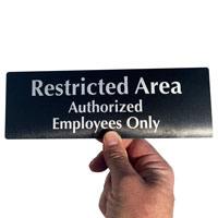 Restricted authorized employees only Sign made from durable anodized aluminum