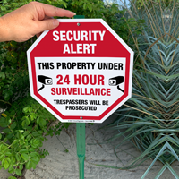 24 hour surveillance sign for lawn