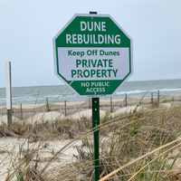 Dune rebuilding keep off dunes sign