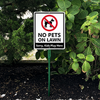 Keep dogs off grass, children's play area sign