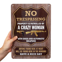 No Trespassing Sign: Property Patrolled by Crazy Woman