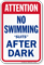 Attention No Swimming Suits After Dark Sign